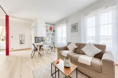 Coin salon dans l'établissement T2 lumineux avec balcon - Calme, vue dégagée