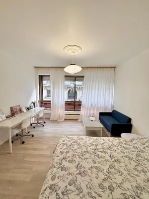 Coin salon dans l'établissement Le Berri Chic Studio-Steps from Champs-Élysées