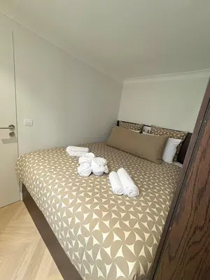 Un ou plusieurs lits dans un hébergement de l'établissement Elegant 1BR Monthly Rental near Place Vendôme