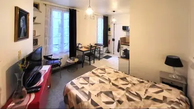 Un ou plusieurs lits dans un hébergement de l'établissement Mon Art Studio - Montmartre - Sacré-Cœur - Paris