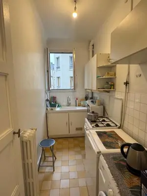 Cuisine ou kitchenette dans l'établissement Cozy studio in Paris 13e