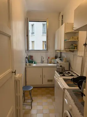 Cuisine ou kitchenette dans l'établissement Cozy studio in Paris 13e
