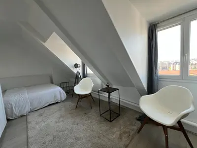 Un ou plusieurs lits dans un hébergement de l'établissement Apartment in Paris 16th arrondissement Exelmans Auteuil