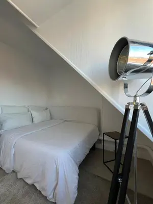 Un ou plusieurs lits dans un hébergement de l'établissement Apartment in Paris 16th arrondissement Exelmans Auteuil