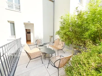 Jardin de l'établissement Maison chaleureuse à Paris !