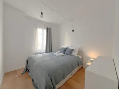Un ou plusieurs lits dans un hébergement de l'établissement Maison chaleureuse à Paris !