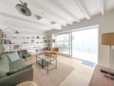Coin salon dans l'établissement Maison chaleureuse à Paris !