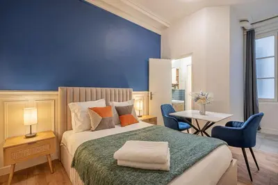 Un ou plusieurs lits dans un hébergement de l'établissement Studio Douillet pour 2 au Cœur de Montmartre - IV