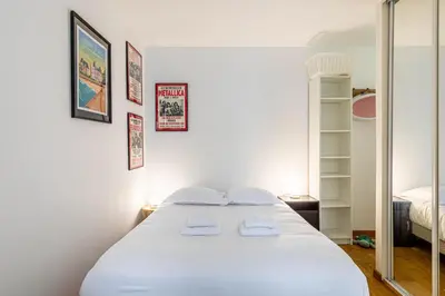 Un ou plusieurs lits dans un hébergement de l'établissement GuestReady - Paris getaway in La Chapelle
