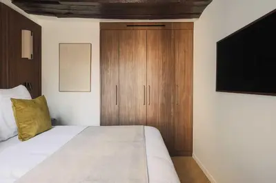 Un ou plusieurs lits dans un hébergement de l'établissement AC Apartment 2BR 6P - Notre-Dame de Paris