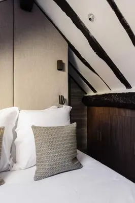 Un ou plusieurs lits dans un hébergement de l'établissement AC Apartment 2BR 6P - Notre-Dame de Paris