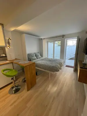Un ou plusieurs lits dans un hébergement de l'établissement Studio spacieux avec terrasse privée, clim et parking payants
