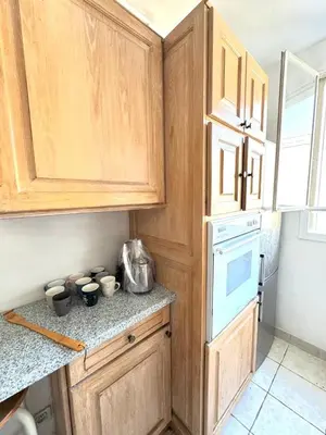 Cuisine ou kitchenette dans l'établissement Grand Appartement Tour Eiffel Place Barcelone