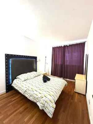 Un ou plusieurs lits dans un hébergement de l'établissement Grand Appartement Tour Eiffel Place Barcelone