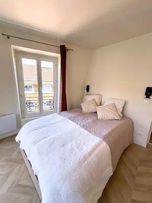 Un ou plusieurs lits dans un hébergement de l'établissement T2 lumineux et cosy - Levallois, Paris