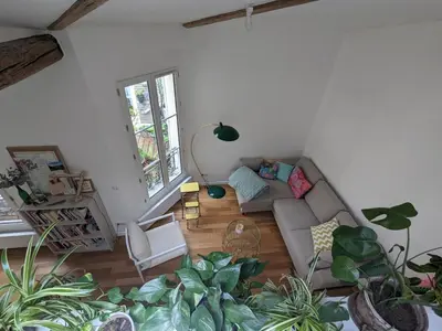 Coin salon dans l'établissement Studio chic et moderne avec mezzanine à 10 min de Montmartre