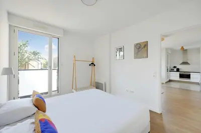 Un ou plusieurs lits dans un hébergement de l'établissement Charming apartment - 2BR-4P- Balcony- Malakoff