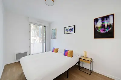 Un ou plusieurs lits dans un hébergement de l'établissement Charming apartment - 2BR-4P- Balcony- Malakoff