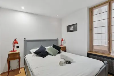 Un ou plusieurs lits dans un hébergement de l'établissement BnBNova - 1BR - Saint Germain & Odéon