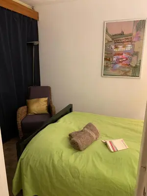 Un ou plusieurs lits dans un hébergement de l'établissement Montparnasse, central, comfortable, view, AC