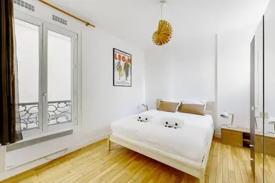 Un ou plusieurs lits dans un hébergement de l'établissement Paris City Center Vibrant