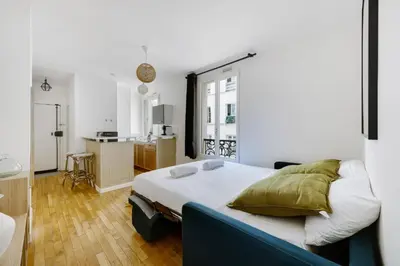 Un ou plusieurs lits dans un hébergement de l'établissement Paris City Center Vibrant
