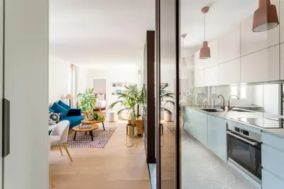 Cuisine ou kitchenette dans l'établissement Boi Cozy Charming Apartment Trocadero