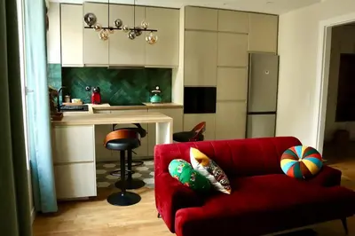Cuisine ou kitchenette dans l'établissement Stylish and Cozy Renovated Apartment Paris 10