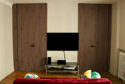 Télévision ou salle de divertissement dans l'établissement Stylish and Cozy Renovated Apartment Paris 10