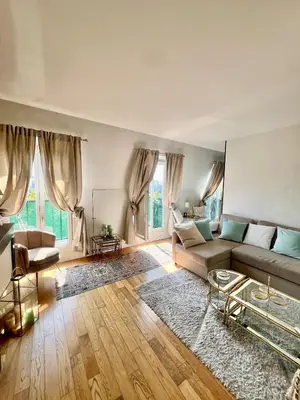 Un ou plusieurs lits dans un hébergement de l'établissement Charming Parisian apartment