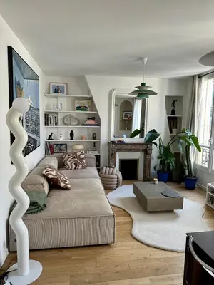 Coin salon dans l'établissement Cosy Parisian flat in the 9th