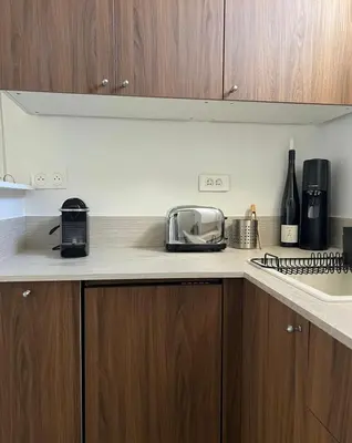 Cuisine ou kitchenette dans l'établissement Cosy Parisian flat in the 9th