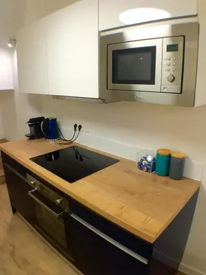Cuisine ou kitchenette dans l'établissement The Blue House