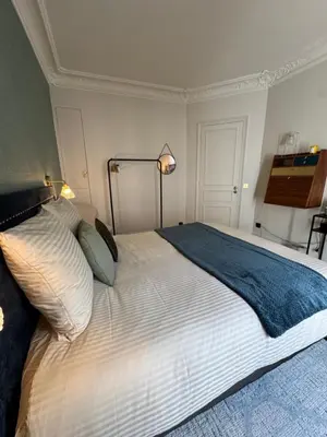 Un ou plusieurs lits dans un hébergement de l'établissement Guest House at Luxembourg by R