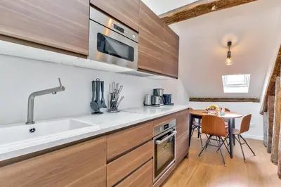 Cuisine ou kitchenette dans l'établissement Urban Flat 117 - Parisian Apartment in the Center
