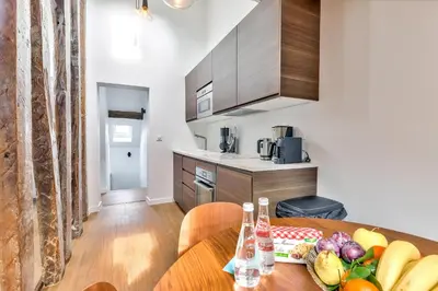 Cuisine ou kitchenette dans l'établissement Urban Flat 117 - Parisian Apartment in the Center