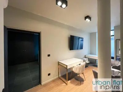 Télévision ou salle de divertissement dans l'établissement Urban Flat 117 - Parisian Apartment in the Center