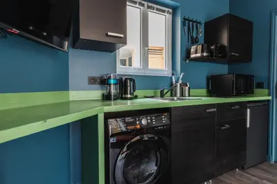 Cuisine ou kitchenette dans l'établissement Comfortable Souplex - 4P - Place d'Italie
