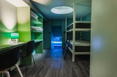 Un ou plusieurs lits dans un hébergement de l'établissement Comfortable Souplex - 4P - Place d'Italie