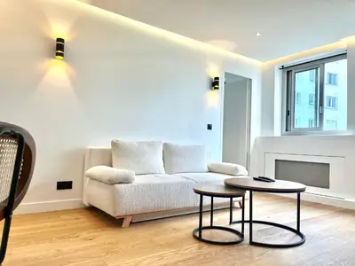Coin salon dans l'établissement Nice Flat in West Paris, near Seine