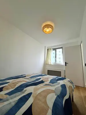 Un ou plusieurs lits dans un hébergement de l'établissement Nice Flat in West Paris, near Seine