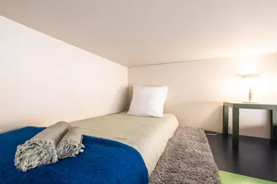 Un ou plusieurs lits dans un hébergement de l'établissement Saint-Honore - Art Deco Flat - Sleeps 5P