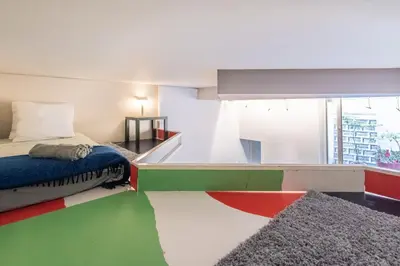 Un ou plusieurs lits dans un hébergement de l'établissement Saint-Honore - Art Deco Flat - Sleeps 5P