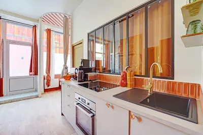 Cuisine ou kitchenette dans l'établissement Cozy flat with jacuzzi - 2bdr