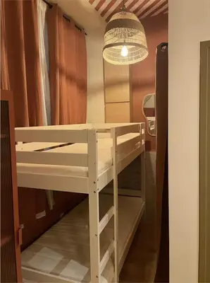Un ou plusieurs lits dans un hébergement de l'établissement Cozy flat with jacuzzi - 2bdr