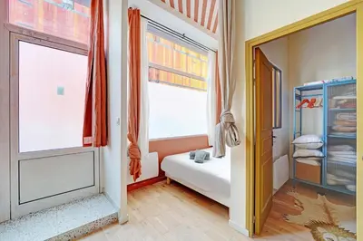 Un ou plusieurs lits dans un hébergement de l'établissement Cozy flat with jacuzzi - 2bdr