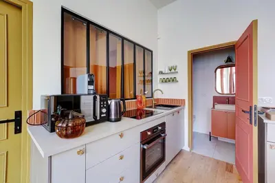 Cuisine ou kitchenette dans l'établissement Cozy flat with jacuzzi - 2bdr
