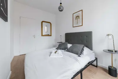 Un ou plusieurs lits dans un hébergement de l'établissement Appartement 40m2 Parc des Expositions - 6P