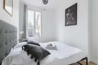 Un ou plusieurs lits dans un hébergement de l'établissement Appartement 40m2 Parc des Expositions - 6P
