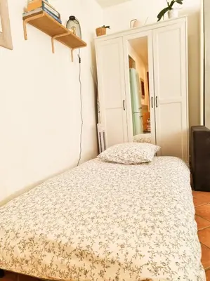 Un ou plusieurs lits dans un hébergement de l'établissement EXIGEHOME-Large studio with terrace 15 min Paris-La Défense